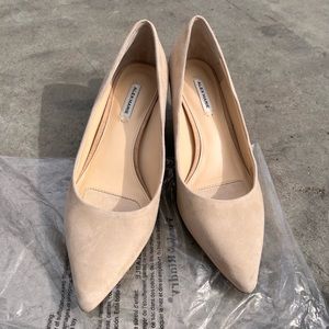 Nude suede 2 inch heels. Match anything In your closet with these chic heels!